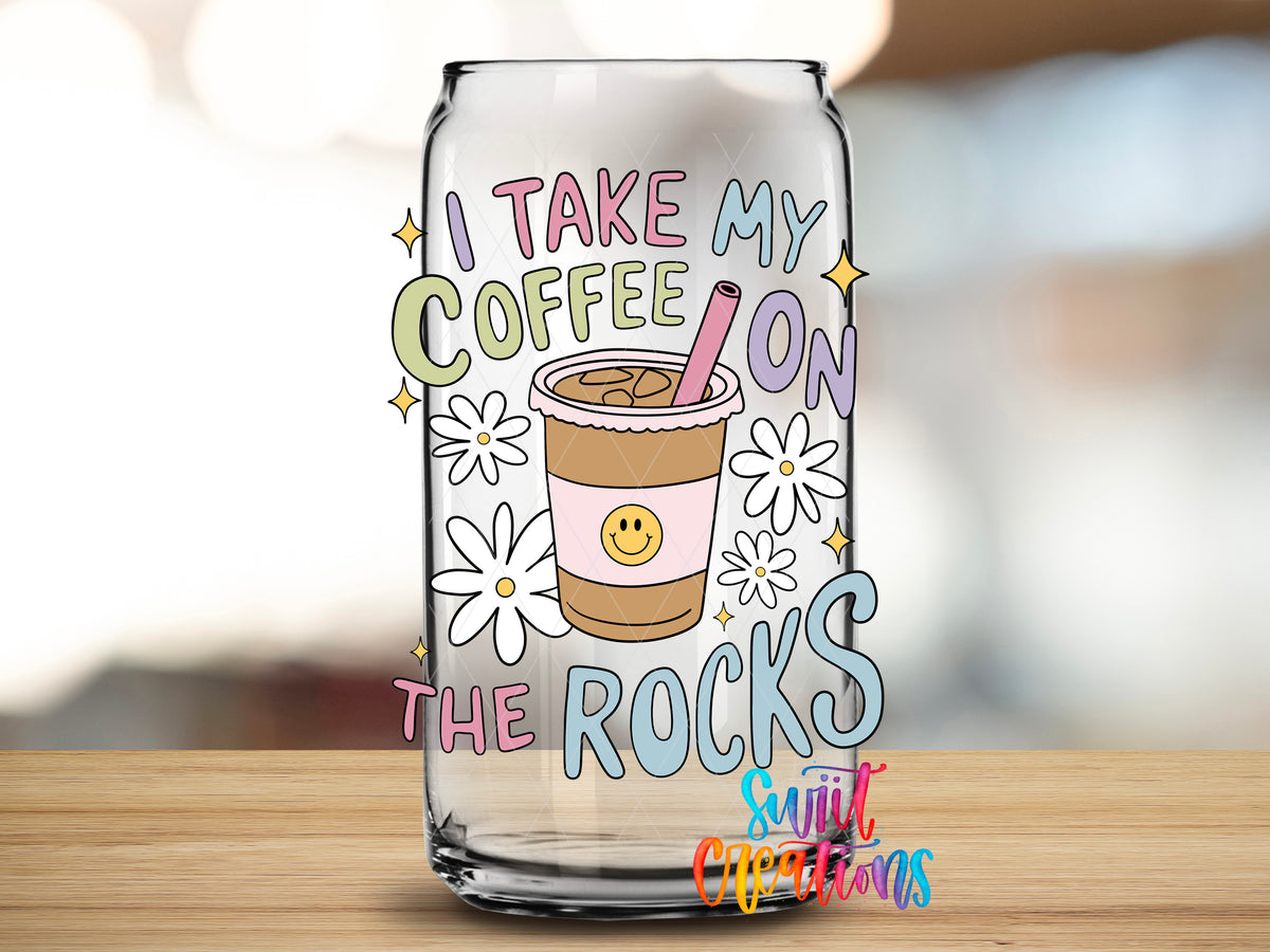 Coffee on the Rocks design close-up on a clear glass can tumbler