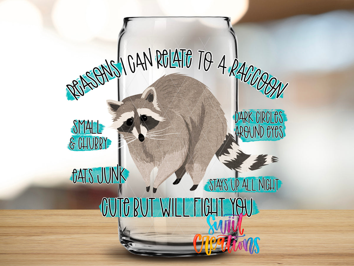 Reasons I Relate to a Raccoon design close-up on a clear glass can tumbler