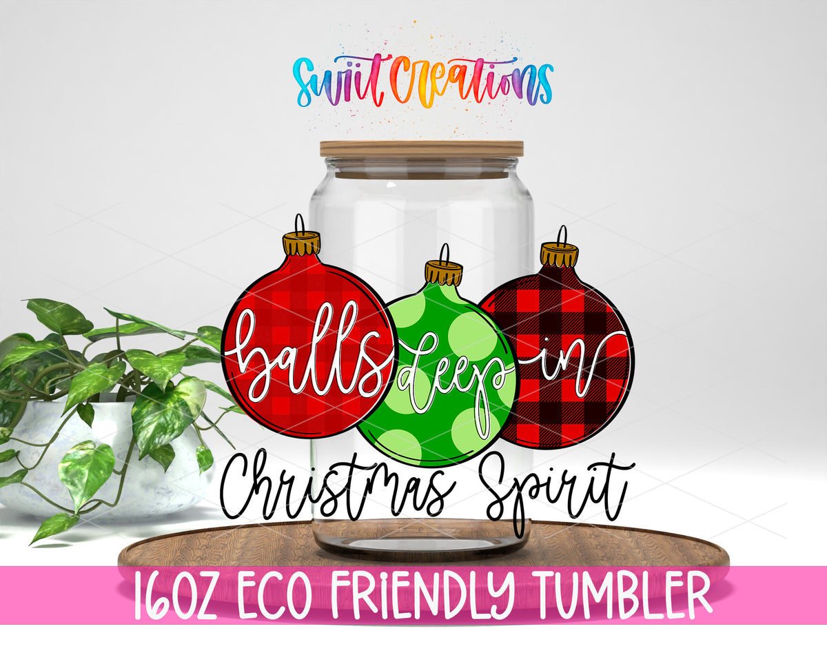 Balls Deep in Christmas Spirit design on a 16 oz clear glass tumbler with bamboo lid
