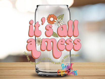 It's All a Mess design close-up on a clear glass can tumbler