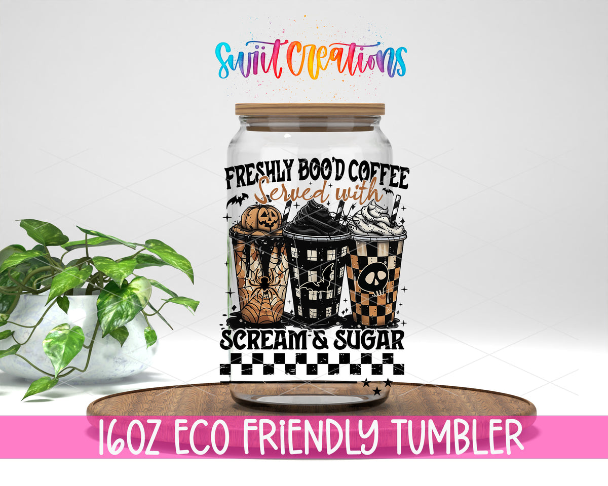 Freshly Boo'd Coffee design on a 16 oz clear glass tumbler with bamboo lid