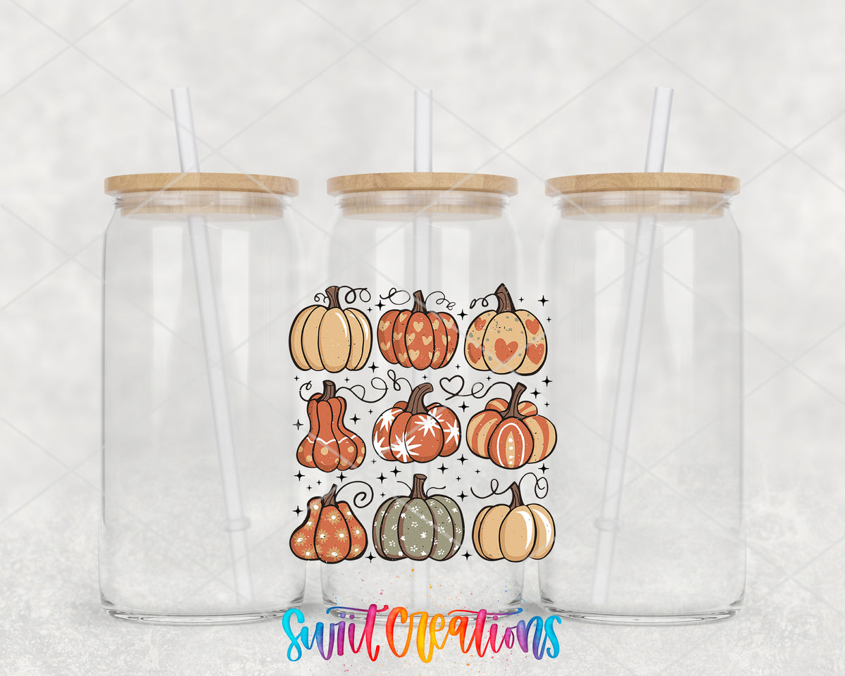 Retro Pumpkin clear glass tumbler group mockup with bamboo lids and straws