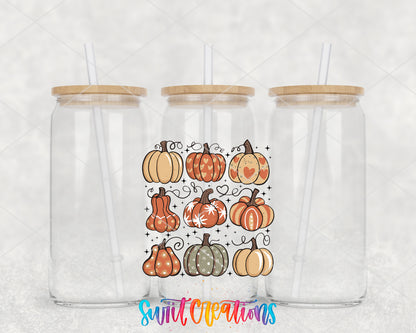 Retro Pumpkin clear glass tumbler group mockup with bamboo lids and straws