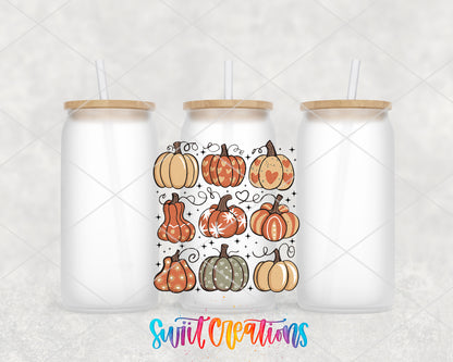 Retro Pumpkin frosted glass tumbler group view with lids and straws