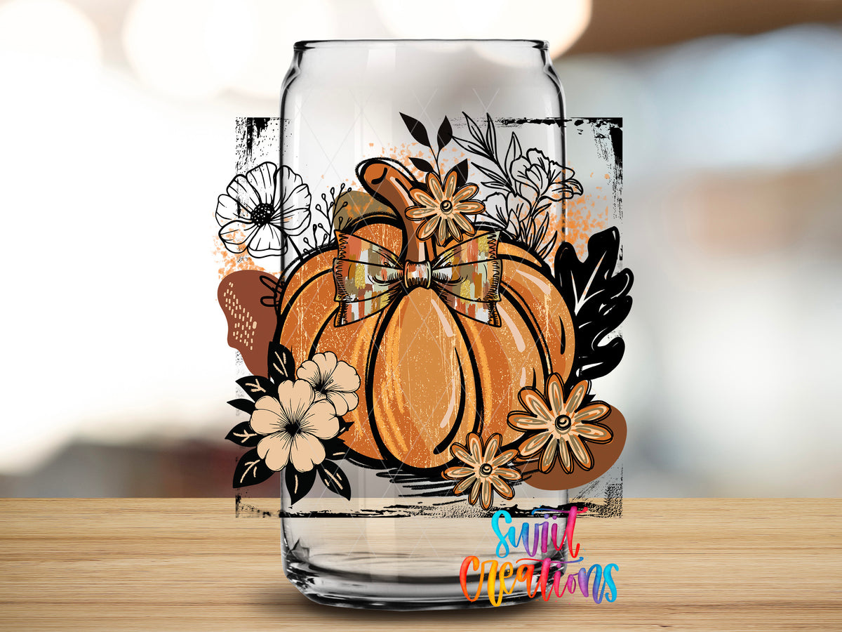 Retro Boho Pumpkin design close-up on a clear glass can tumbler