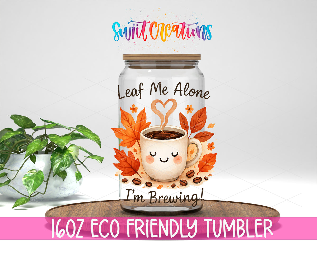 Leaf Me Alone design on a 16 oz clear glass tumbler with bamboo lid