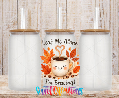 Leaf Me Alone frosted glass tumbler mockup with bamboo lids and straws