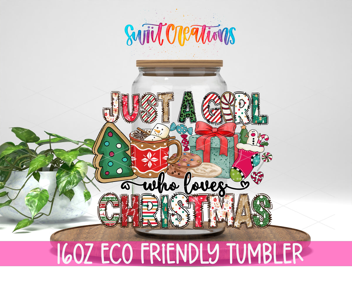 Just a Girl Who Loves Christmas design on a 16 oz clear glass tumbler with bamboo lid