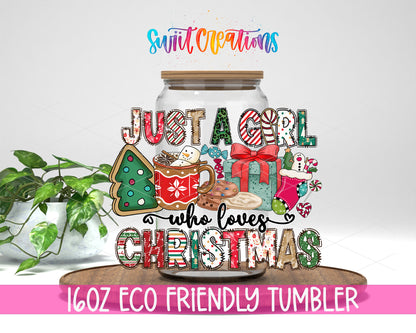 Just a Girl Who Loves Christmas design on a 16 oz clear glass tumbler with bamboo lid