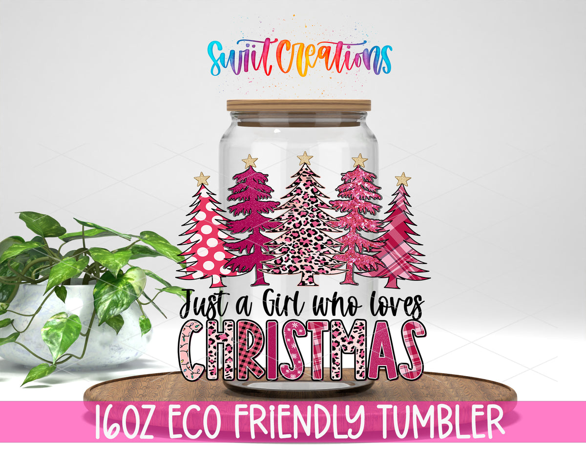 Pink Christmas Girl design on a 16 oz clear glass tumbler with bamboo lid