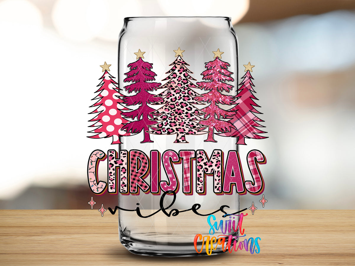 Christmas Vibes design close-up on a clear glass can tumbler