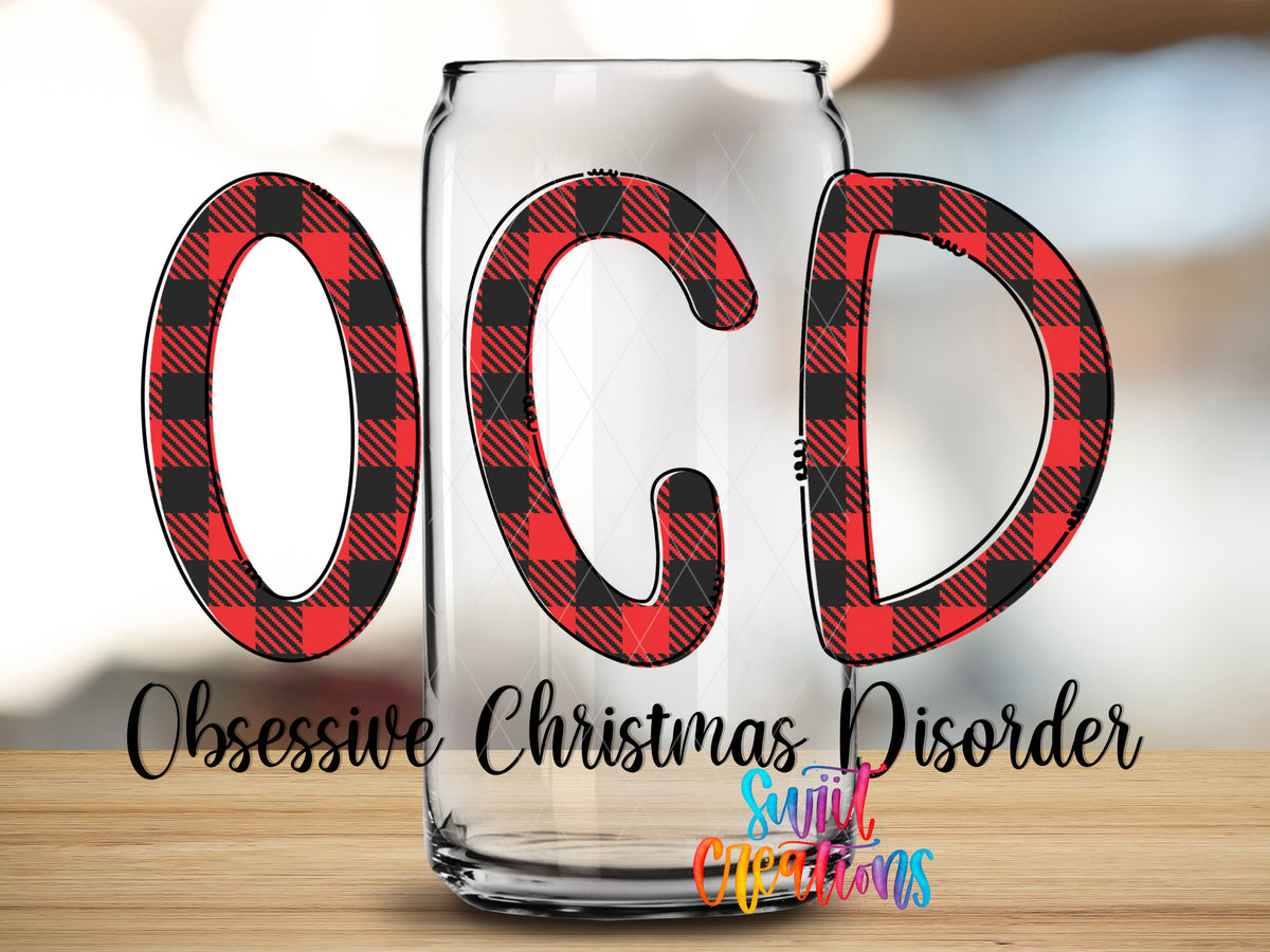 Obsessive Christmas Disorder design close-up on a clear glass can tumbler