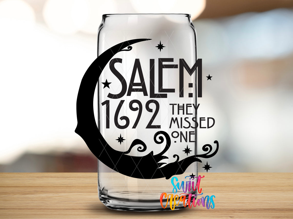 Salem Missed One design close-up on a clear glass can tumbler