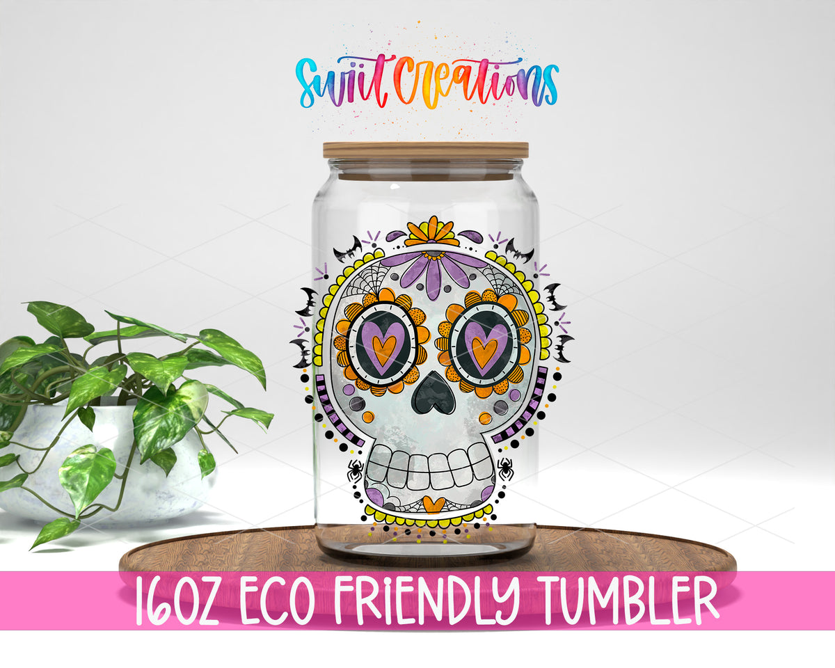 Halloween Sugar Skull design on a 16 oz clear glass tumbler with bamboo lid