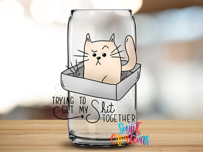 Trying to Get My Shit Together design close-up on a clear glass can tumbler