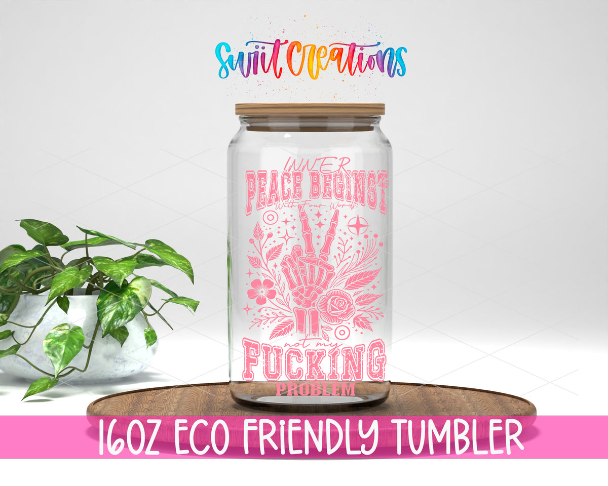 Inner Peace Is Not My Problem Pink design on a 16 oz clear glass tumbler with bamboo lid
