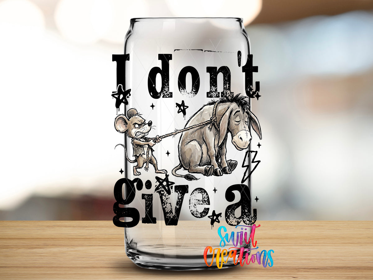 I Don't Give a Rat's Ass design close-up on a clear glass can tumbler