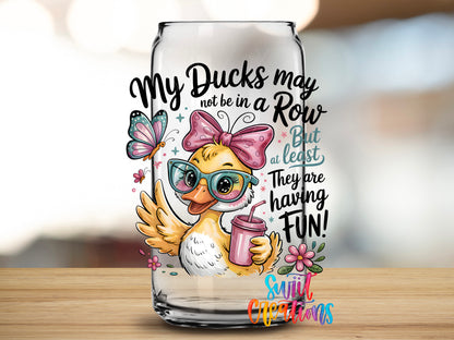 My Ducks May Not Be in a Row design close-up on a clear glass can tumbler