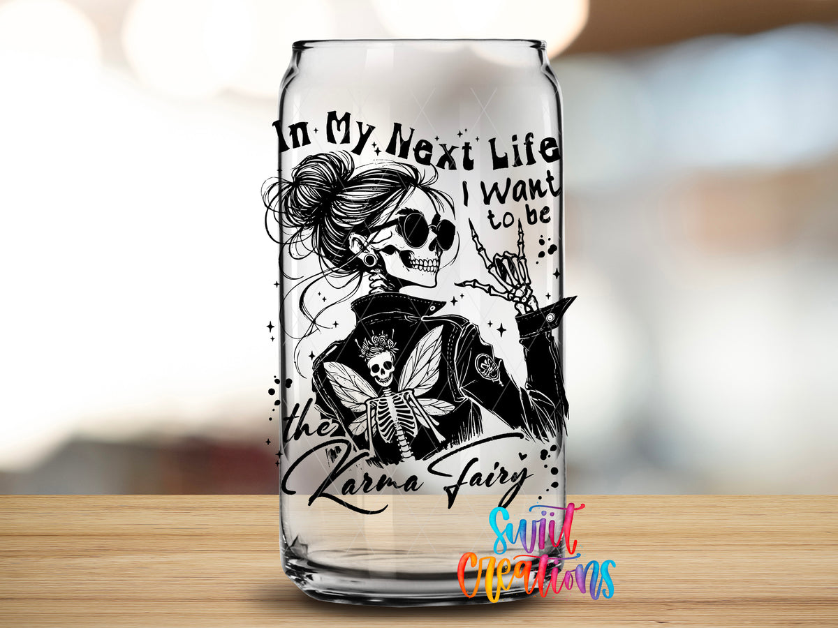 Karma Fairy design close-up on a clear glass can tumbler