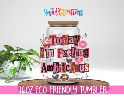 I'm Feeling Ambitchous design on a 16 oz clear glass tumbler with bamboo lid