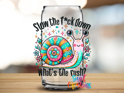 Slow the Fuck Down design close-up on a clear glass can tumbler
