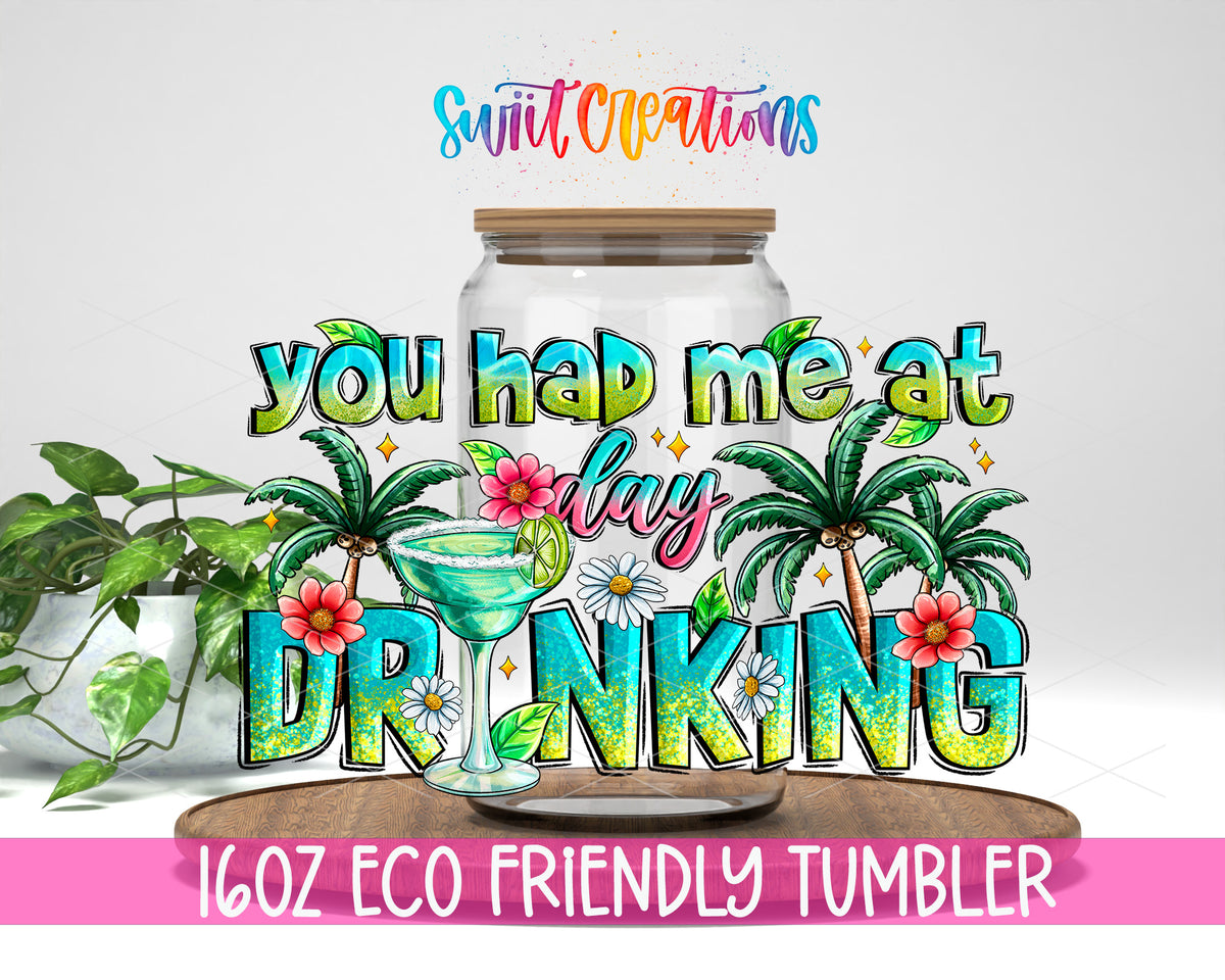 You Had Me at Day Drinking design on a 16 oz clear glass tumbler with bamboo lid