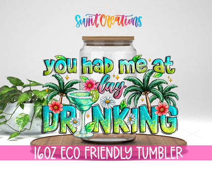 You Had Me at Day Drinking design on a 16 oz clear glass tumbler with bamboo lid