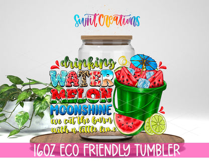 Drinking Watermelon Moonshine design on a 16 oz clear glass tumbler with bamboo lid