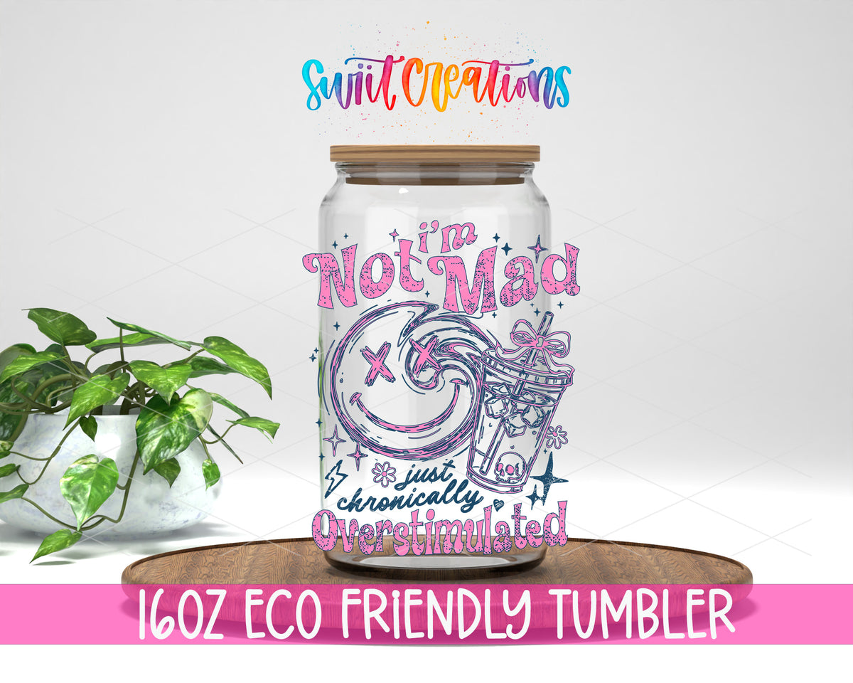 I'm Not Mad Just Overstimulated design on a 16 oz clear glass tumbler with bamboo lid
