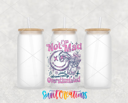 I'm Not Mad Just Overstimulated frosted glass tumbler group view with lids and straws