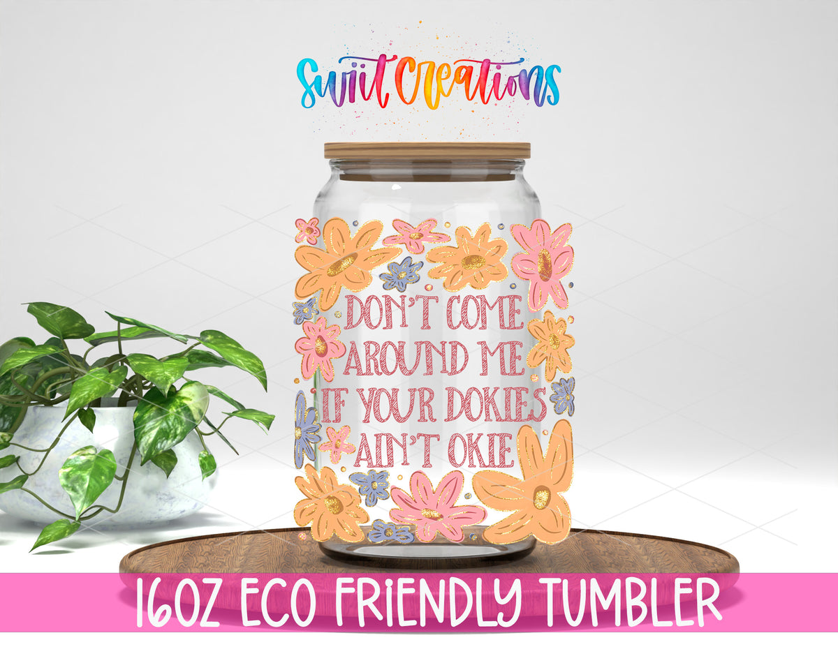 Dookies Ain't Okie design on a 16 oz clear glass tumbler with bamboo lid