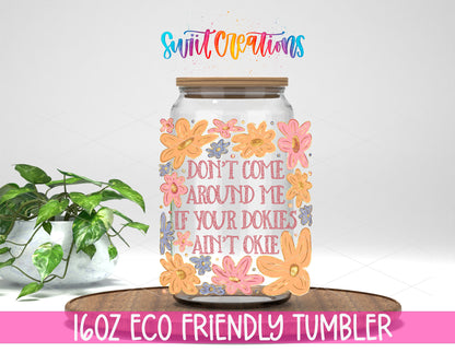 Dookies Ain't Okie design on a 16 oz clear glass tumbler with bamboo lid