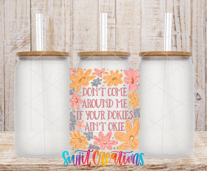 Dookies Ain't Okie frosted glass tumbler mockup with bamboo lids and straws