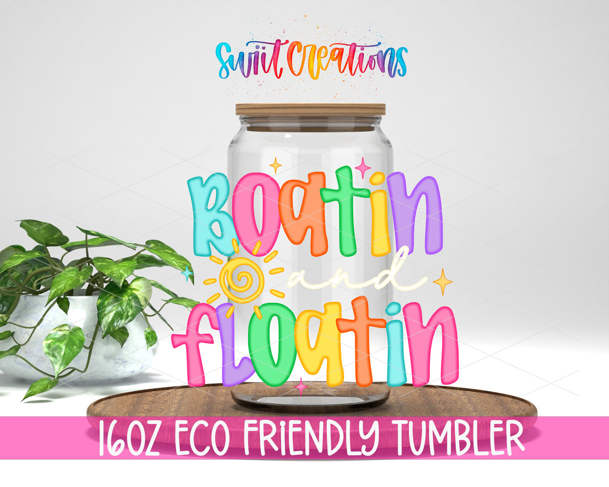 Boatin' and Floatin' design on a 16 oz clear glass tumbler with bamboo lid