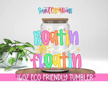 Boatin' and Floatin' design on a 16 oz clear glass tumbler with bamboo lid