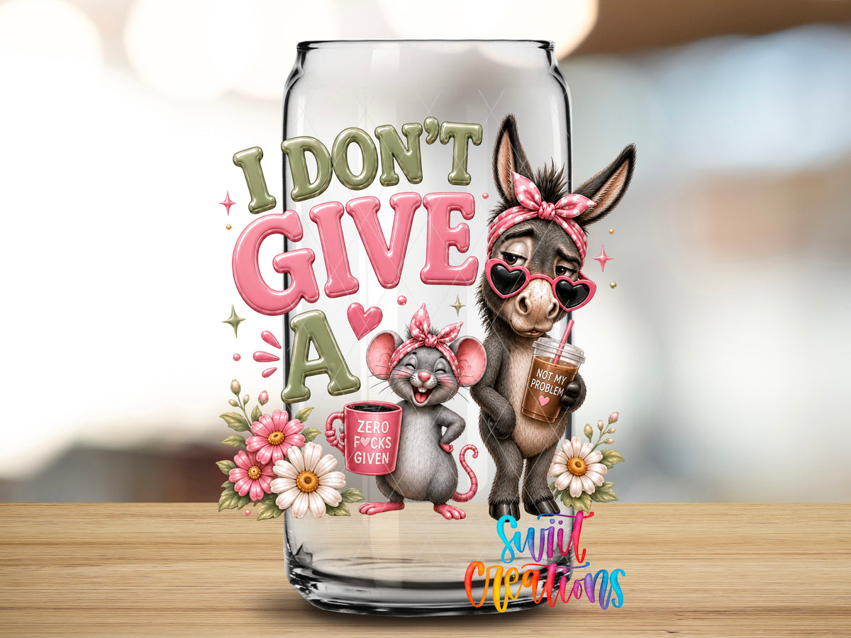 I Don't Give a Rat's Ass design close-up on a clear glass can tumbler