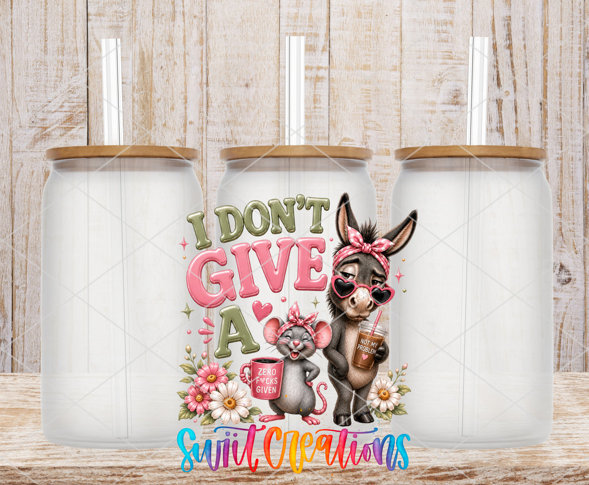 I Don't Give a Rat's Ass frosted glass tumbler mockup with bamboo lids and straws