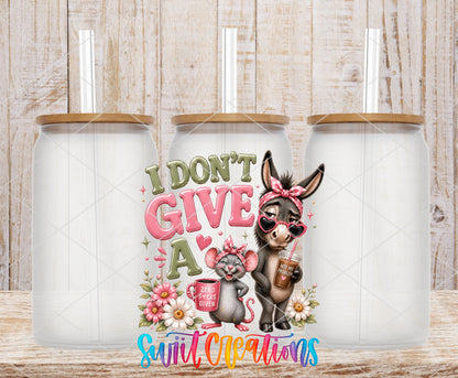 I Don't Give a Rat's Ass frosted glass tumbler mockup with bamboo lids and straws