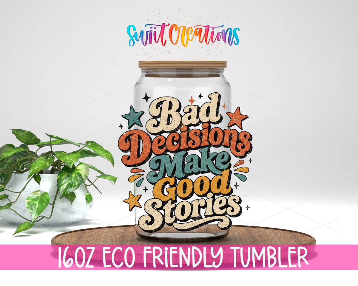 Bad Decisions Make Good Stories design on a 16 oz clear glass tumbler with bamboo lid