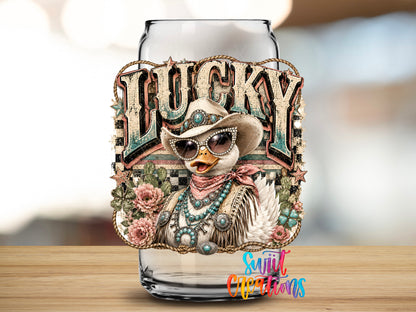 Western Glam Lucky Duck design close-up on a clear glass can tumbler