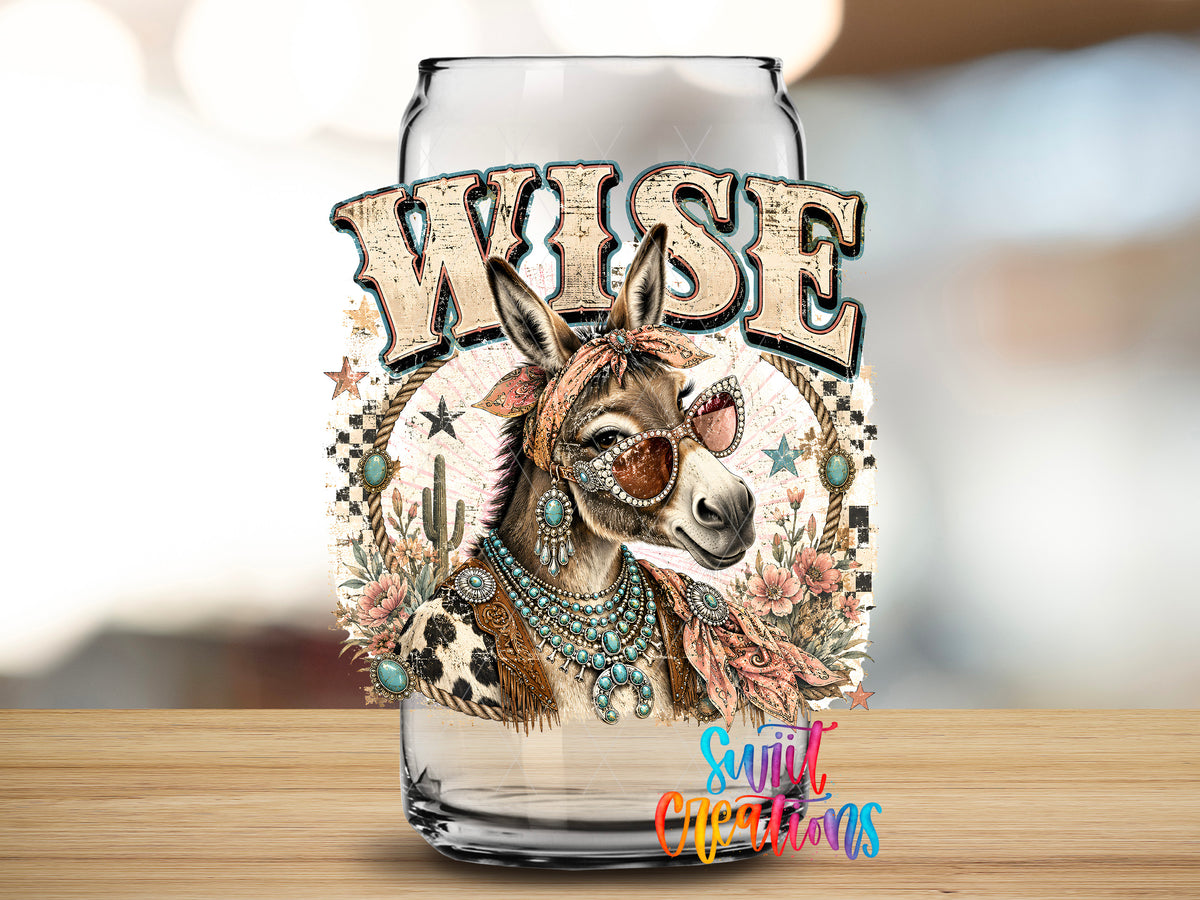 Western Glam Wise Ass design close-up on a clear glass can tumbler