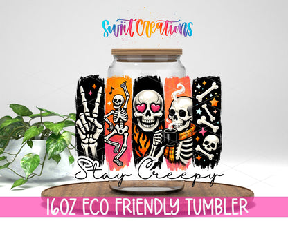 Stay Creepy design on a 16 oz clear glass tumbler with bamboo lid