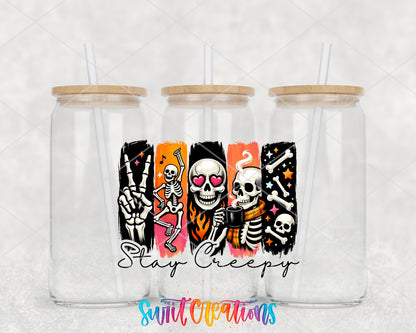 Stay Creepy clear glass tumbler group mockup with bamboo lids and straws