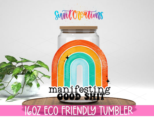 Manifesting Good Shit design on a 16 oz clear glass tumbler with bamboo lid