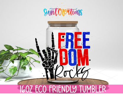 Freedom Rocks design on a 16 oz clear glass tumbler with bamboo lid