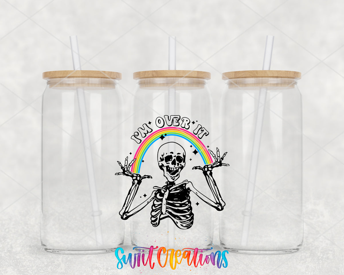I Am Over It Skeleton clear glass tumbler group mockup with bamboo lids and straws