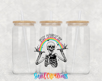 I Am Over It Skeleton clear glass tumbler group mockup with bamboo lids and straws