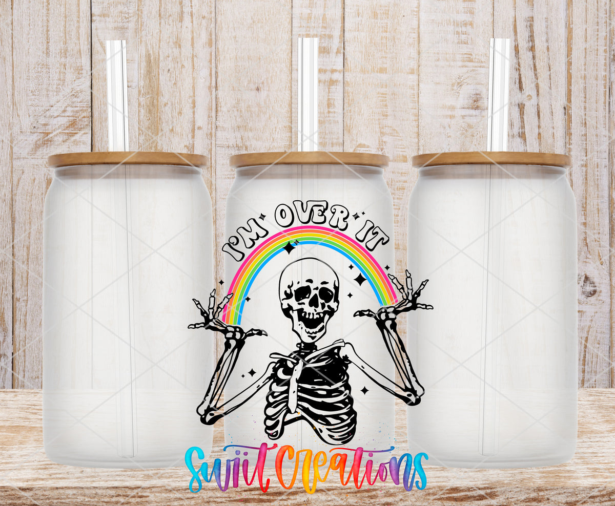I Am Over It Skeleton frosted glass tumbler mockup with bamboo lids and straws