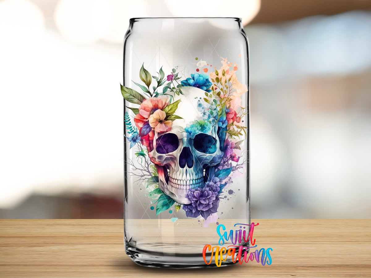 Watercolor Floral Skull design close-up on a clear glass can tumbler