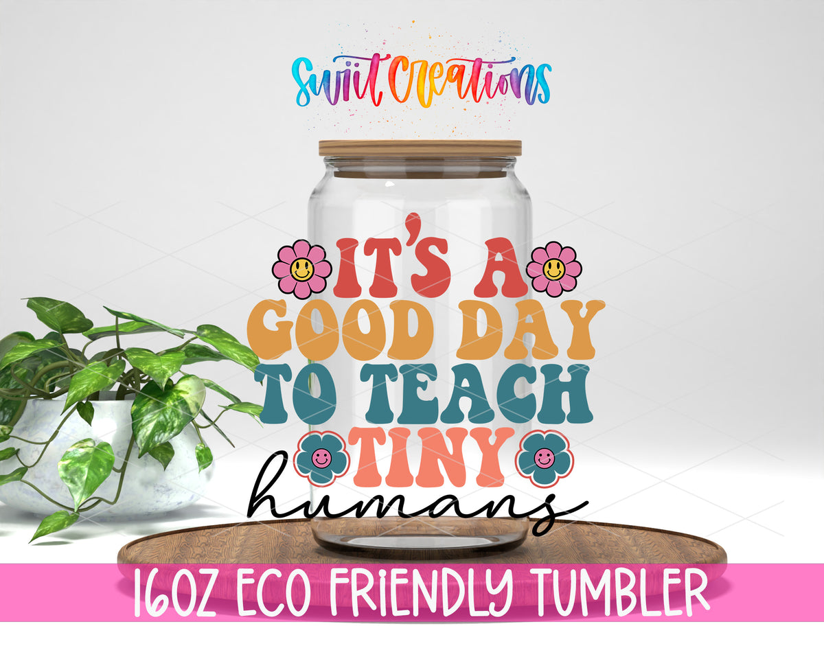 Good Day to Teach Tiny Humans design on a 16 oz clear glass tumbler with bamboo lid